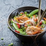Vegetables served with prawns and noodles.